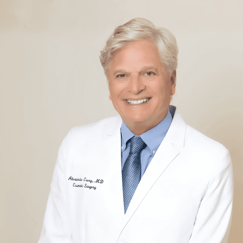 Portrait of Dr. Alexander Covey, a professional stylist at Athena Medspa and Salon, showcasing their expertise and style.