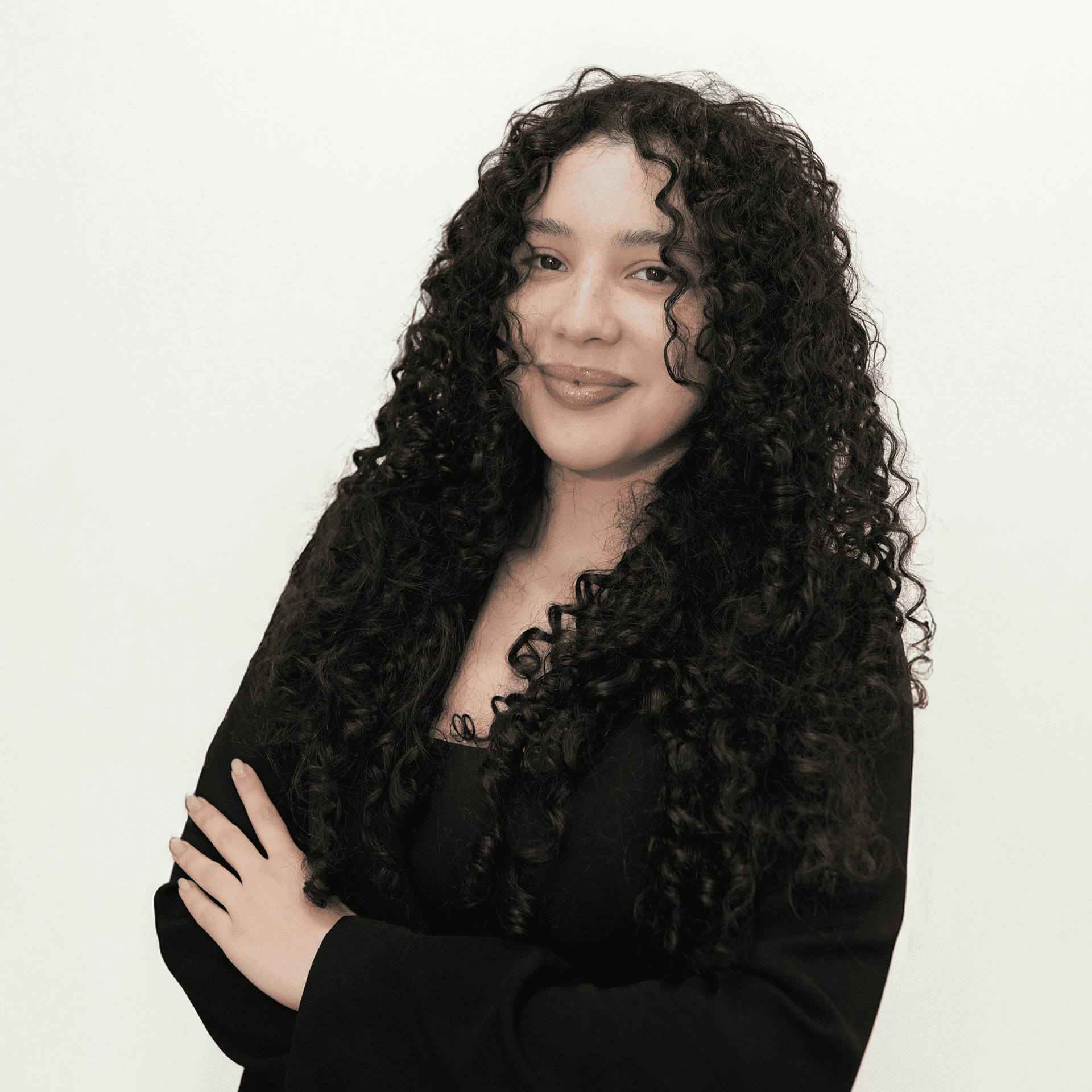 Portrait of Andrea Mata, a professional stylist at Athena Medspa and Salon, showcasing their expertise and style.