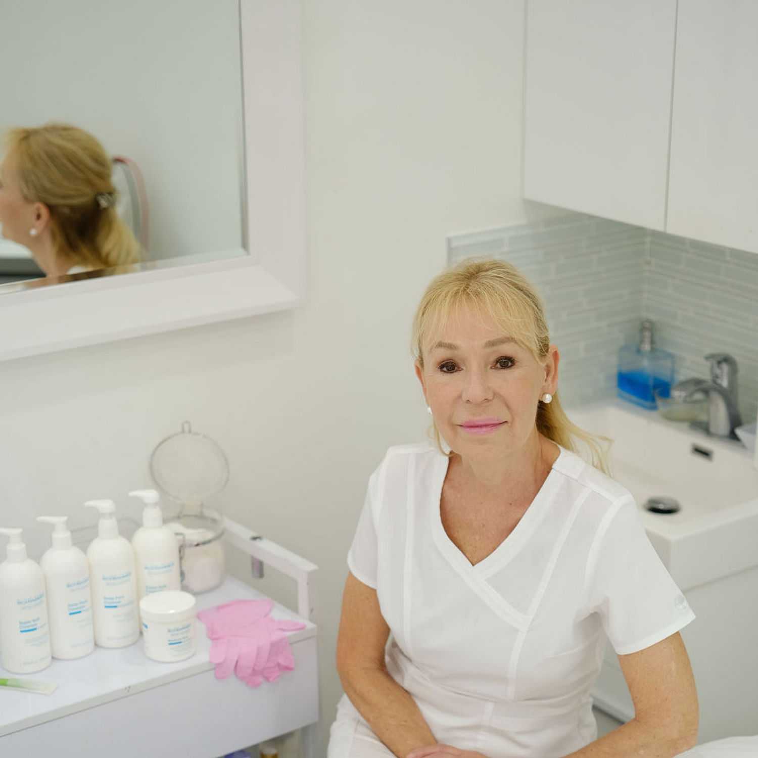 Portrait of Marina Moore, a professional stylist at Athena Medspa and Salon, showcasing their expertise and style.